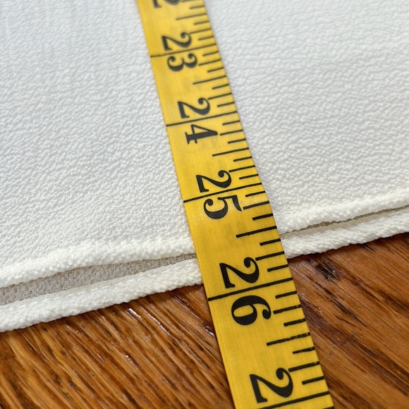 Perfect Peach cream color ruffle sleeve top.  Size Large.  Excellent condition. - Picture 9 of 10